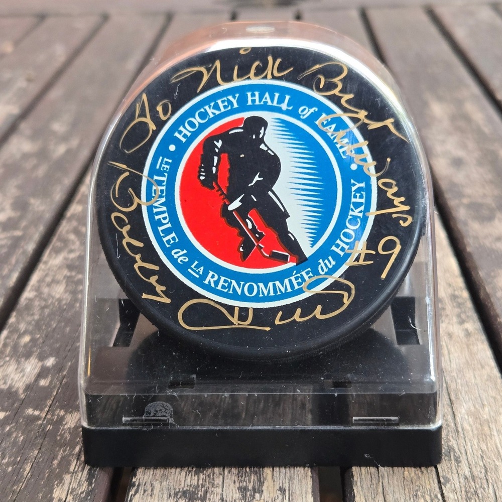 Johnny Bucyk Signed Hockey Hall of Fame Souvenir Puck with Display Case